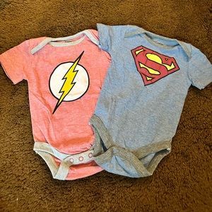 Two Justice league onesies